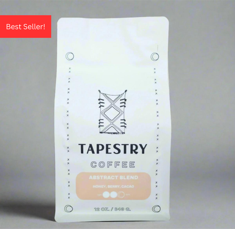 12 oz bag of abstract blend coffee against grey background