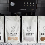 bags of tapestry coffee on kitchen counter